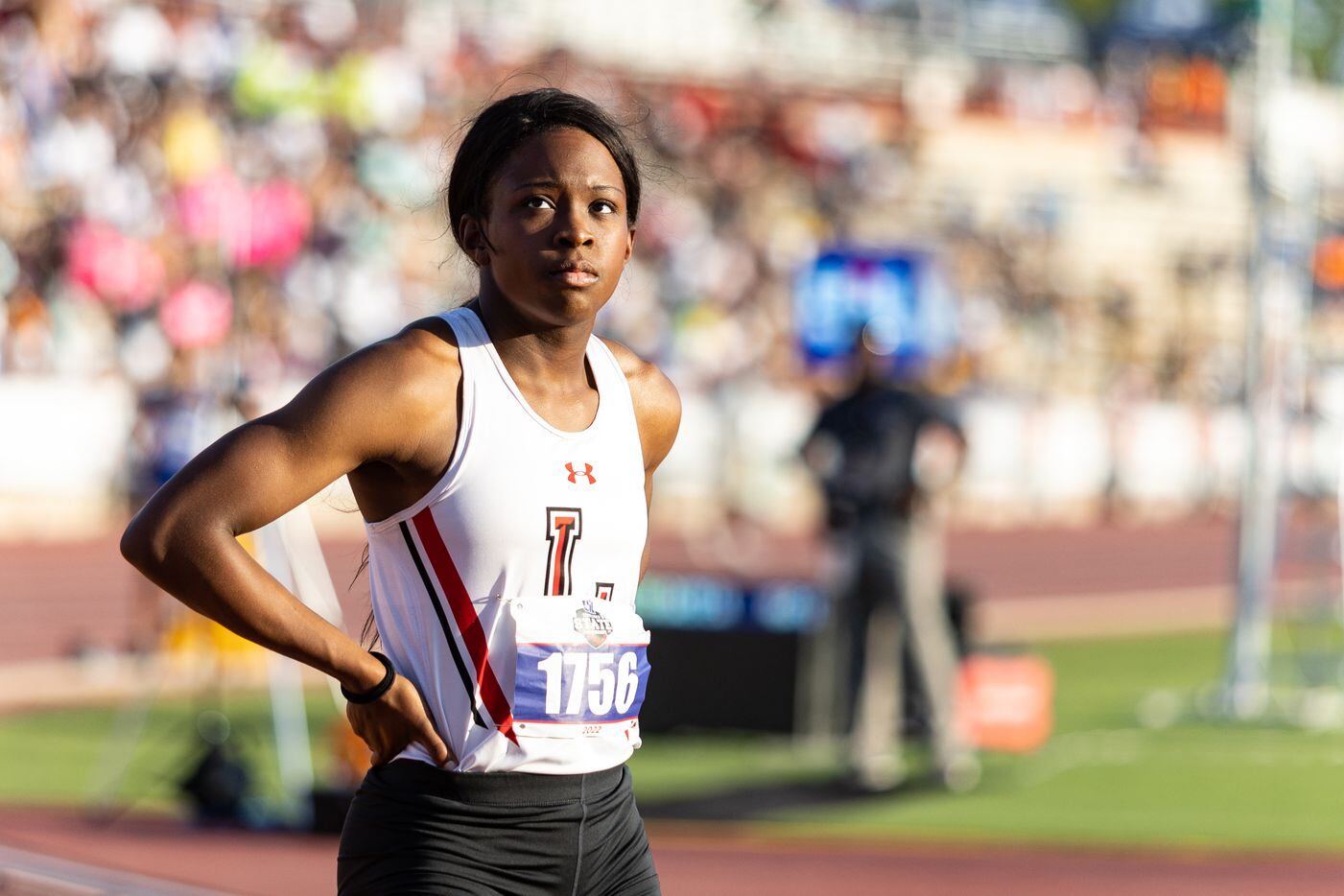Christine Mallard of Mansfield Legacy prepares at the start for the girls’ 400m dash at the...