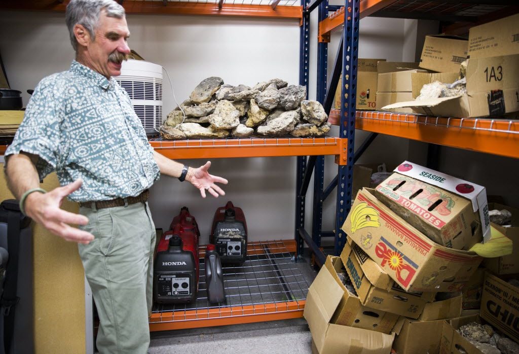 John Geissman, professor of geosciences, describes a large sample of rocks donated by John...