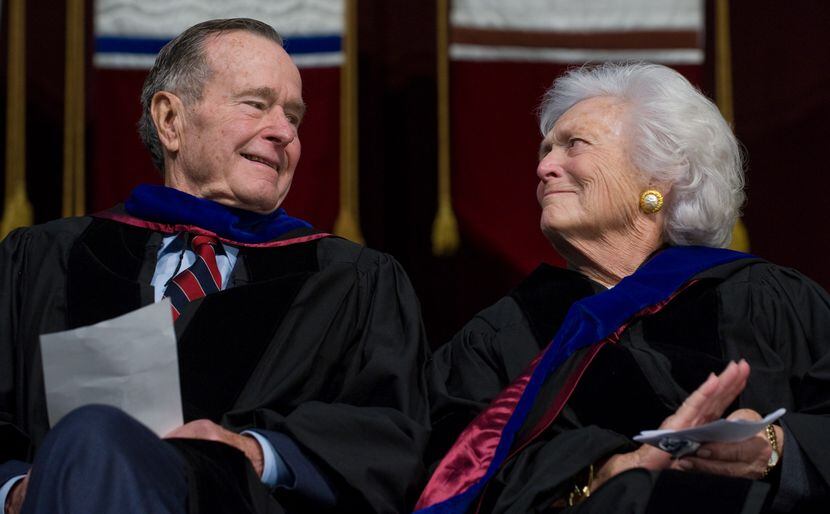 2008: Former President George H.W. Bush and Barbara Bush listen as their son, President...