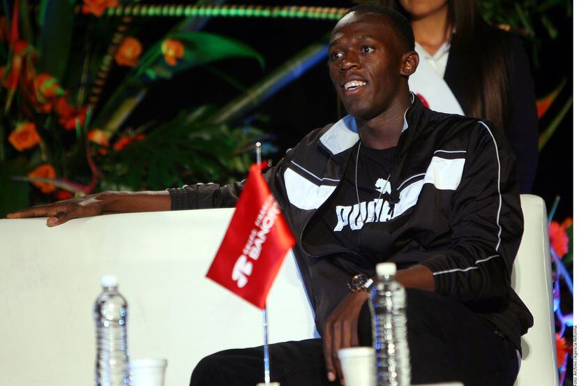 Usain Bolt mantiene un romance de dos años con  la modelo Kasi Bennett. AGENCIA REFORMA 
