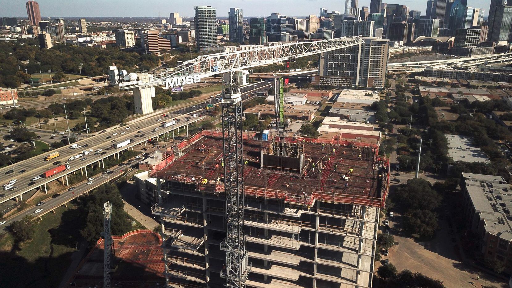 The Urby apartment tower is being built near the intersection of Stemmons Freeway and Oak...