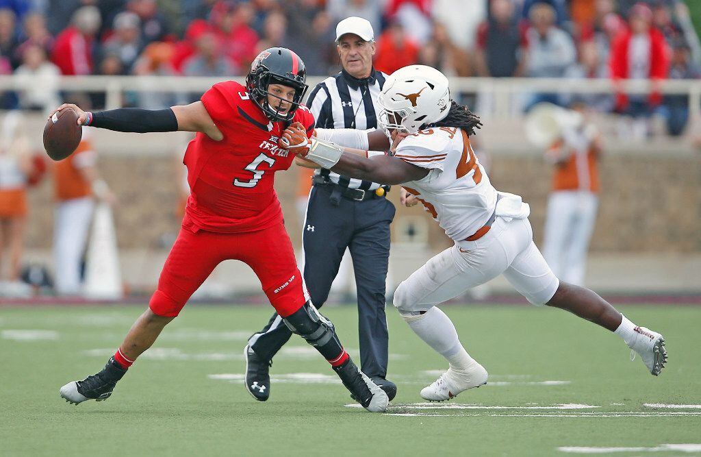 Texas Tech's Patrick Mahomes (5) tries to avoid being sacked by Texas' Malik Jefferson (46) during an NCAA college football game Saturday, Nov. 5, 2016, in Lubbock, Texas. (Brad Tollefson/Lubbock Avalanche-Journal via AP)