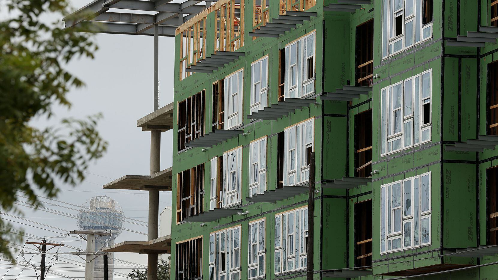 Apartments along Singleton Boulevard near Pastor Street are under construction across the...