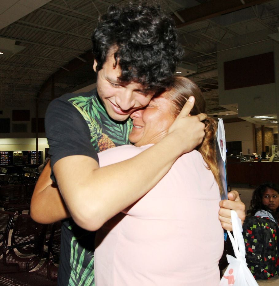 Francisco Galicia, 18, embraced his mother Sanjuana Galicia at the McAllen Central Station...