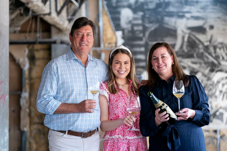 Restaurateur Randy DeWitt, left, stands with his daughter Amanda DeWitt, center, and co-founder Jena Barker. Glass Cellar is expected to open in the Preston Center space in fall 2022.
