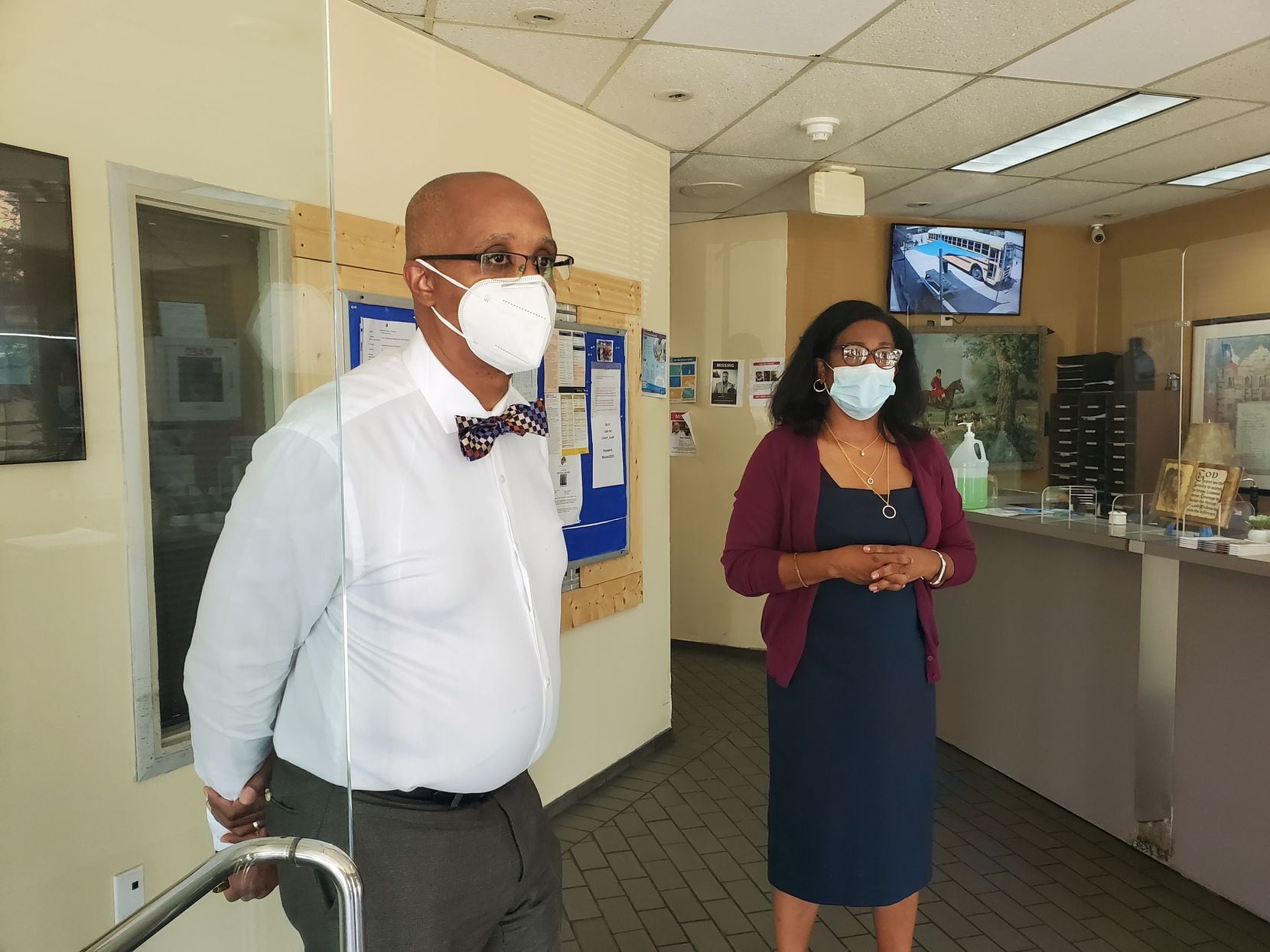 Bruce Butler, CEO of Union Gospel Mission homeless shelter in Dallas, is shown at a mandatory temperature check-in.