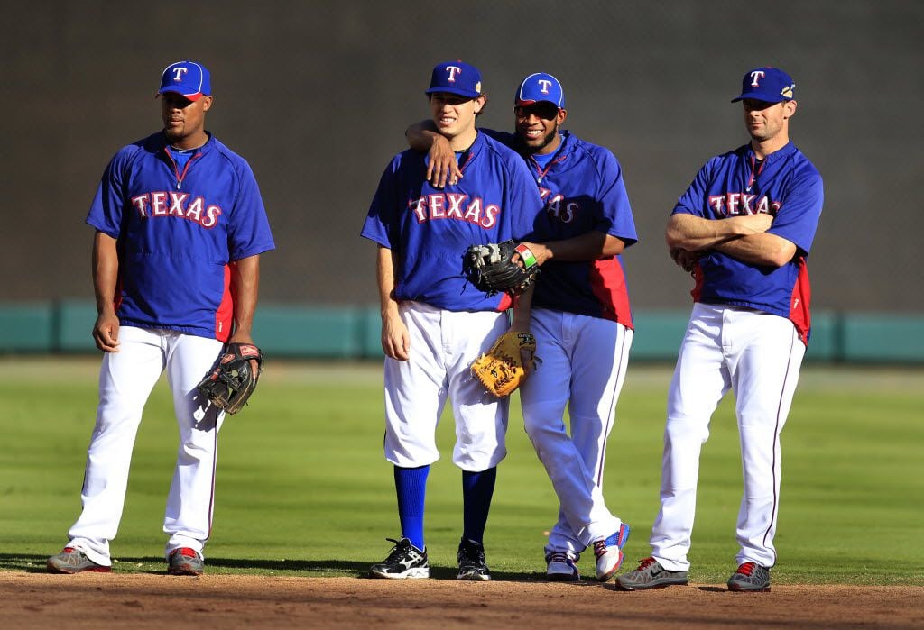 Texas Rangers infielders Adrian Beltre, Ian Kinsler, Elvis Andrus and Michael Young during...