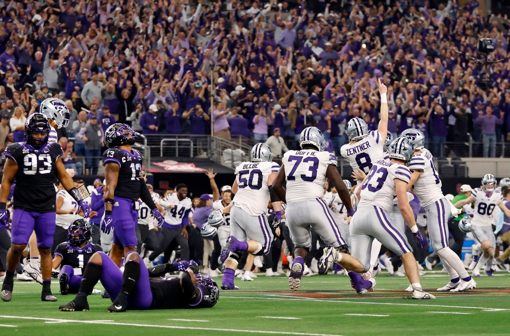 Kansas State Wildcats kicker Ty Zentner (8) celebrates his overtime field goal with his...