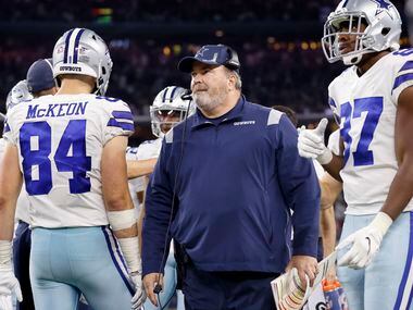 The Dallas Cowboys offense comes off the field as head coach Mike McCarthy looks on during the second half against the Las Vegas Raiders at AT&T Stadium in Arlington, November 25, 2021. The Cowboys lost in overtime to the Raiders, 36-33.