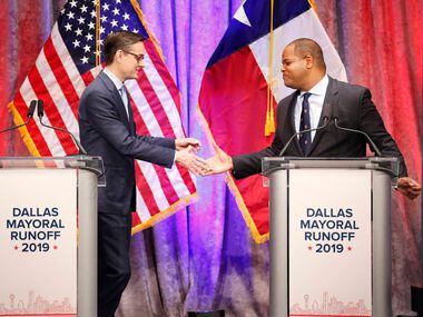Dallas City Council member Scott Griggs (left) and State Rep. Eric Johnson, D-Dallas, shake...