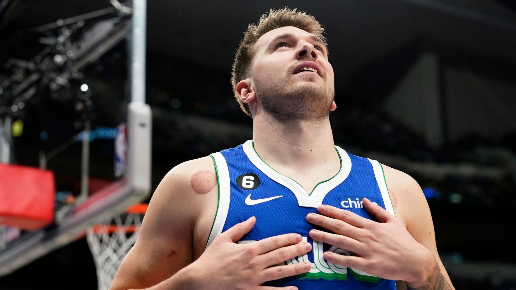 Dallas Mavericks guard Luka Doncic reacts to call during the first quarter of an NBA...