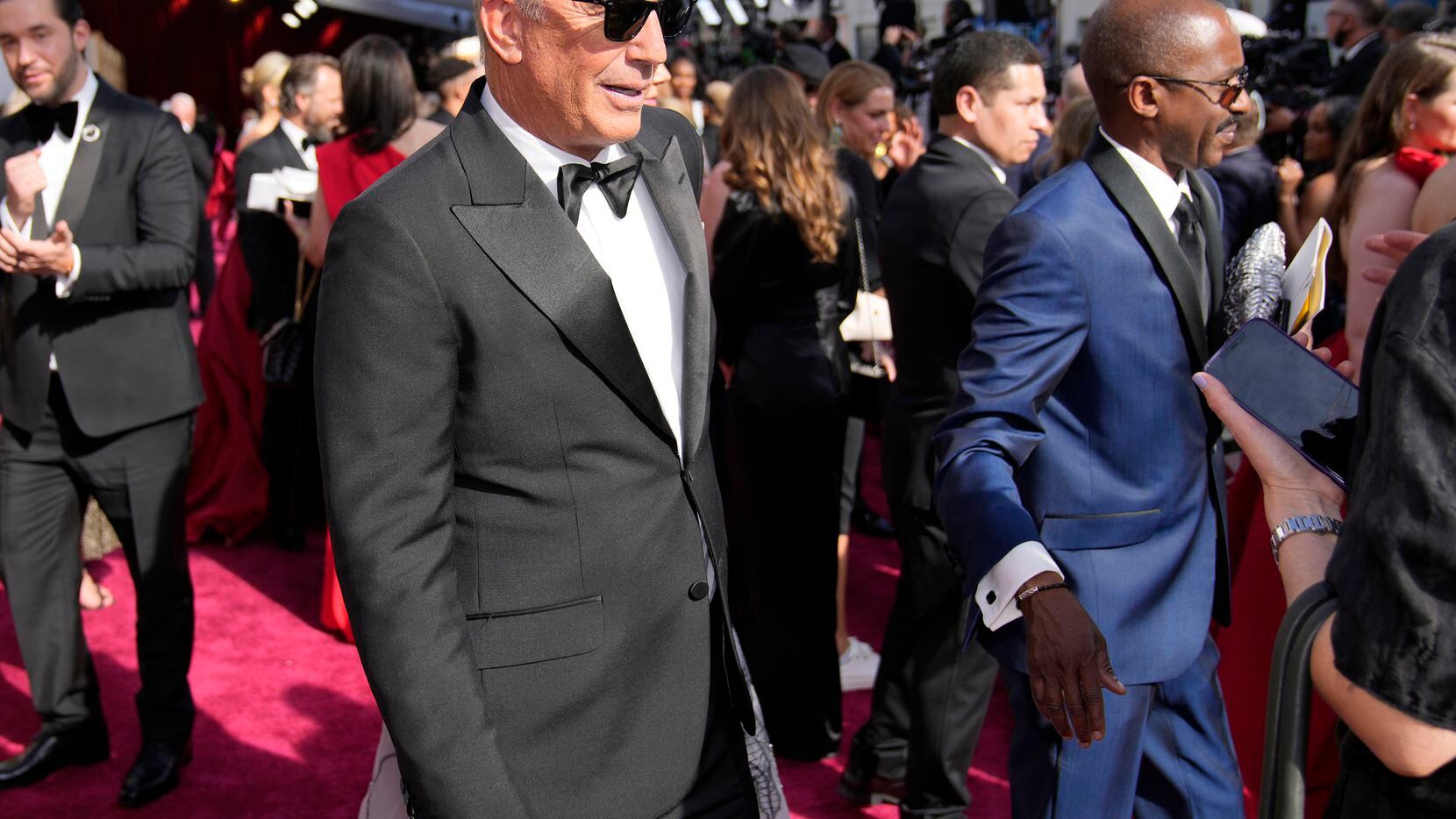 Kevin Costner arrives at the Oscars on Sunday, March 27, 2022, at the Dolby Theatre in Los...