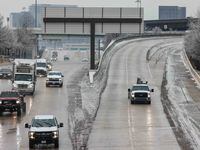 Traffic on N Central Expy in Dallas on Feb. 2, 2023. Temps rise above freezing point as ice...