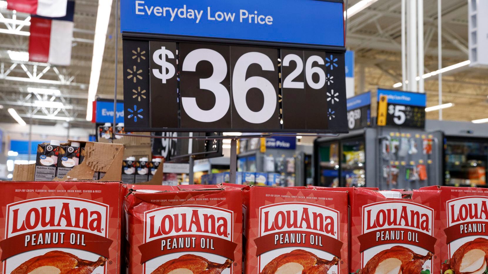Boxes of peanut oil sit in an aisle at a Walmart on Lyndon B. Johnson Freeway in Dallas on...