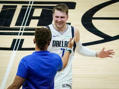 Dallas Mavericks guard Luka Doncic celebrates with Kansas City Chiefs quarterback Patrick Mahomes after the Mavericks 127-121 victory over the LA Clippers in an NBA playoff basketball game at Staples Center on Wednesday, May 26, 2021, in Los Angeles. 