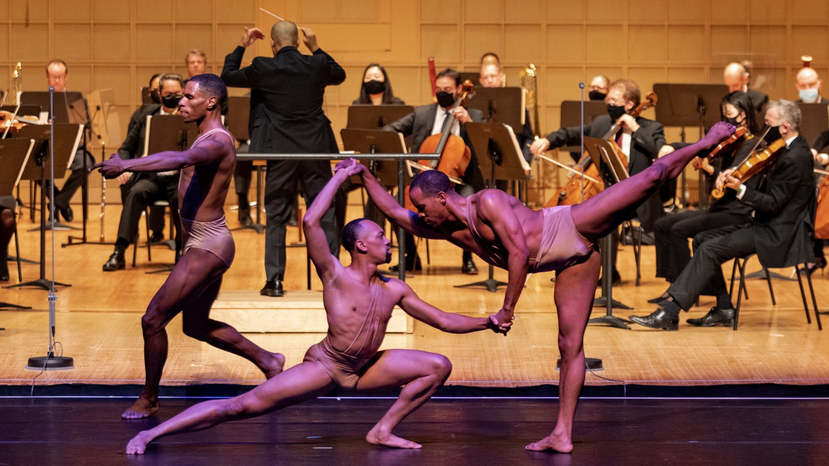 Dancers from the Dallas Black Dance Theatre perform alongside the Dallas Symphony Orchestra.