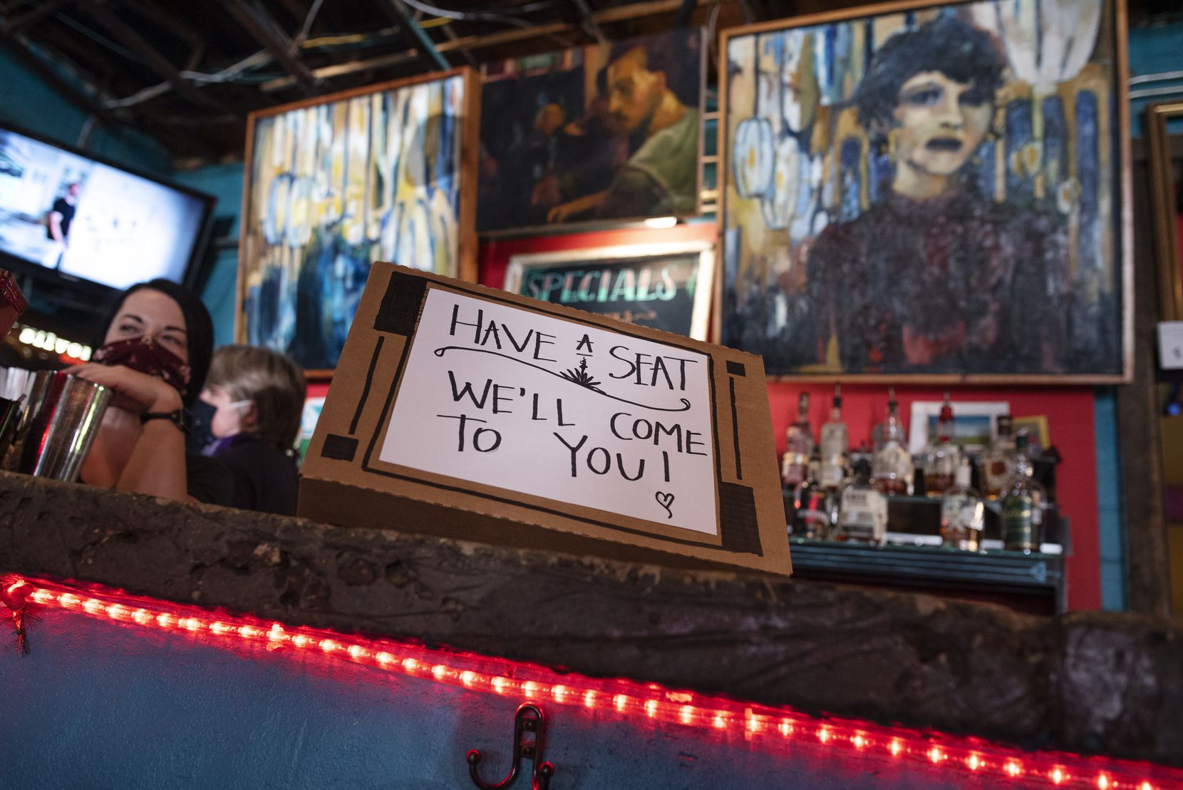 Dan's Silverleaf in Denton had signs in place to help make social distancing easier on Wednesday.