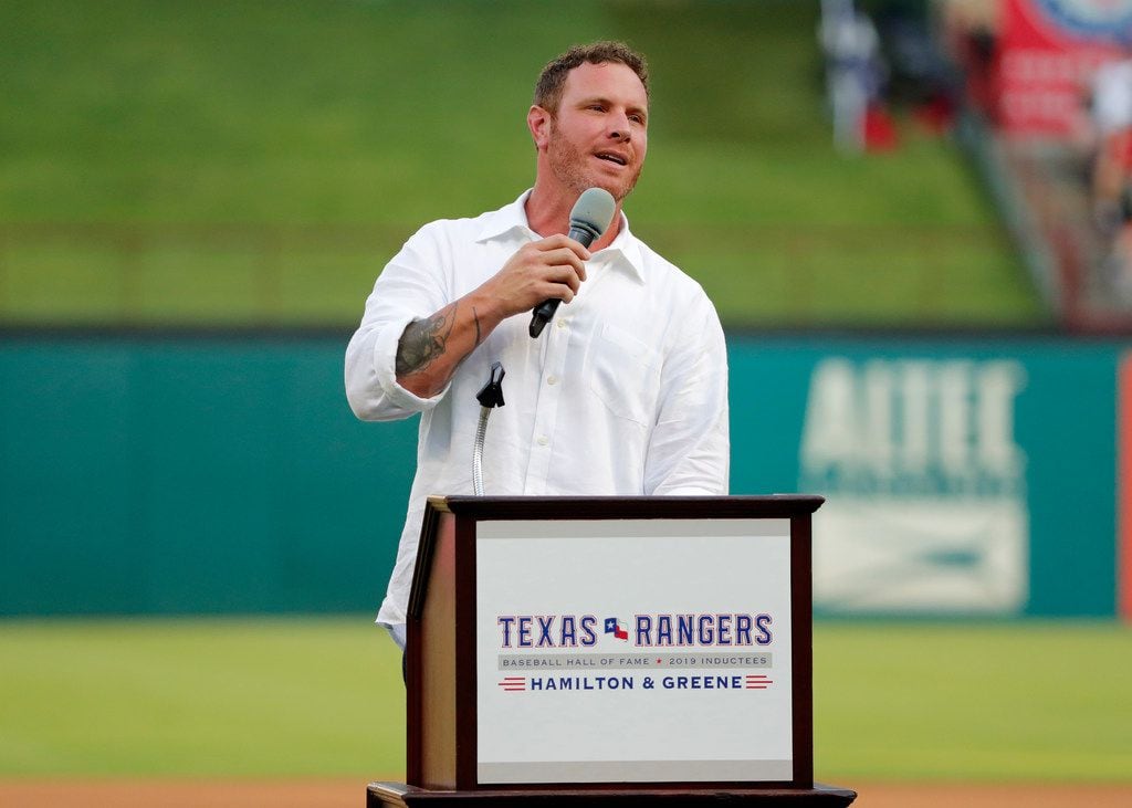 Former Texas Rangers player Josh Hamilton makes comments during a ceremony where the club...