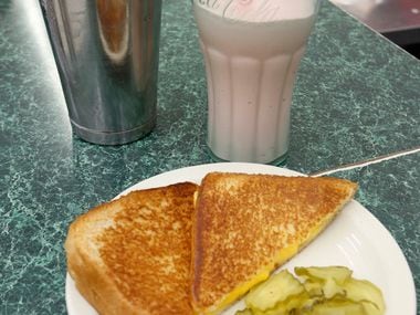 The classic grilled cheese sandwich with a handmade strawberry shake is one specialty...