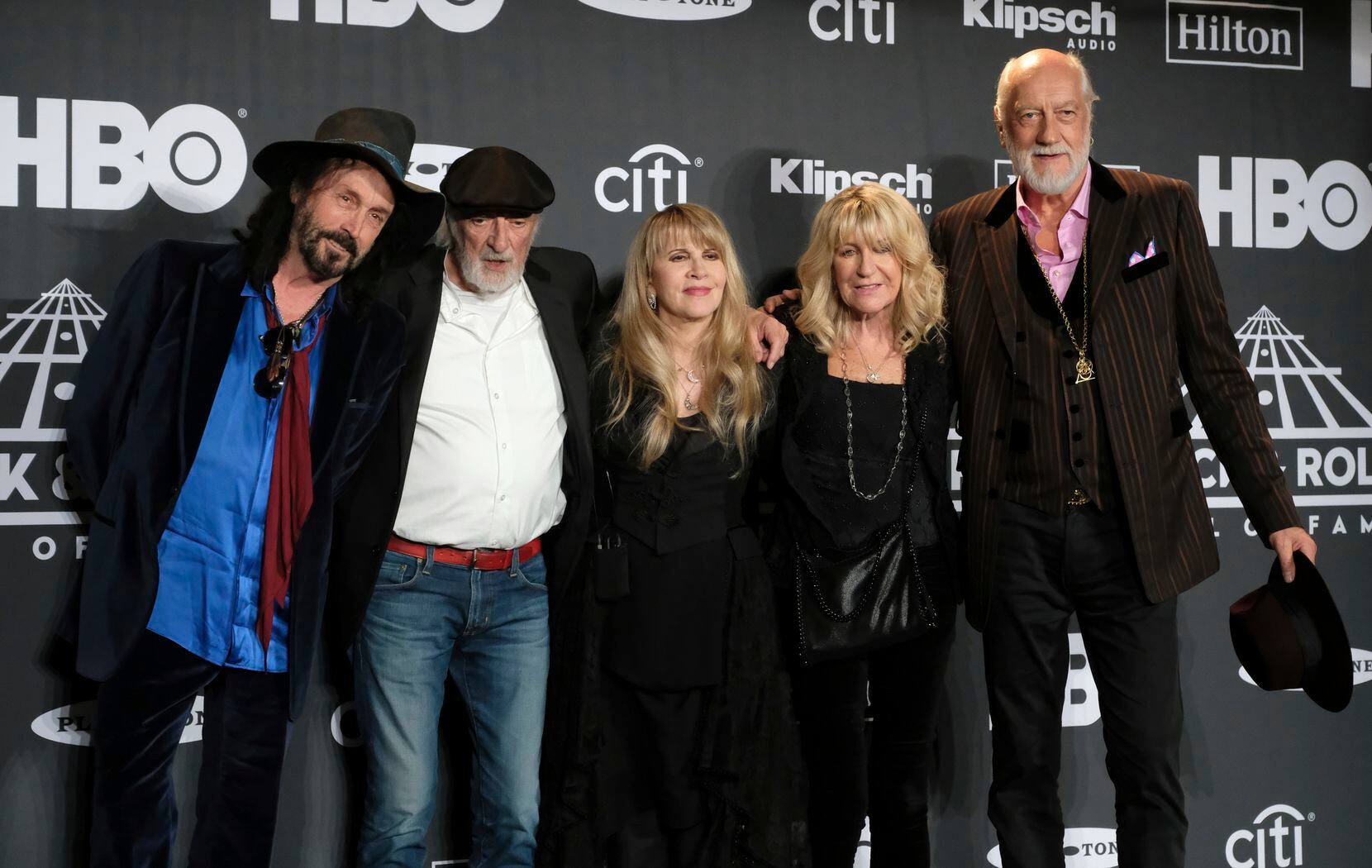 Members of Fleetwood Mac, from left, Mike Campbell, John McVie, Stevie Nicks, Christine...