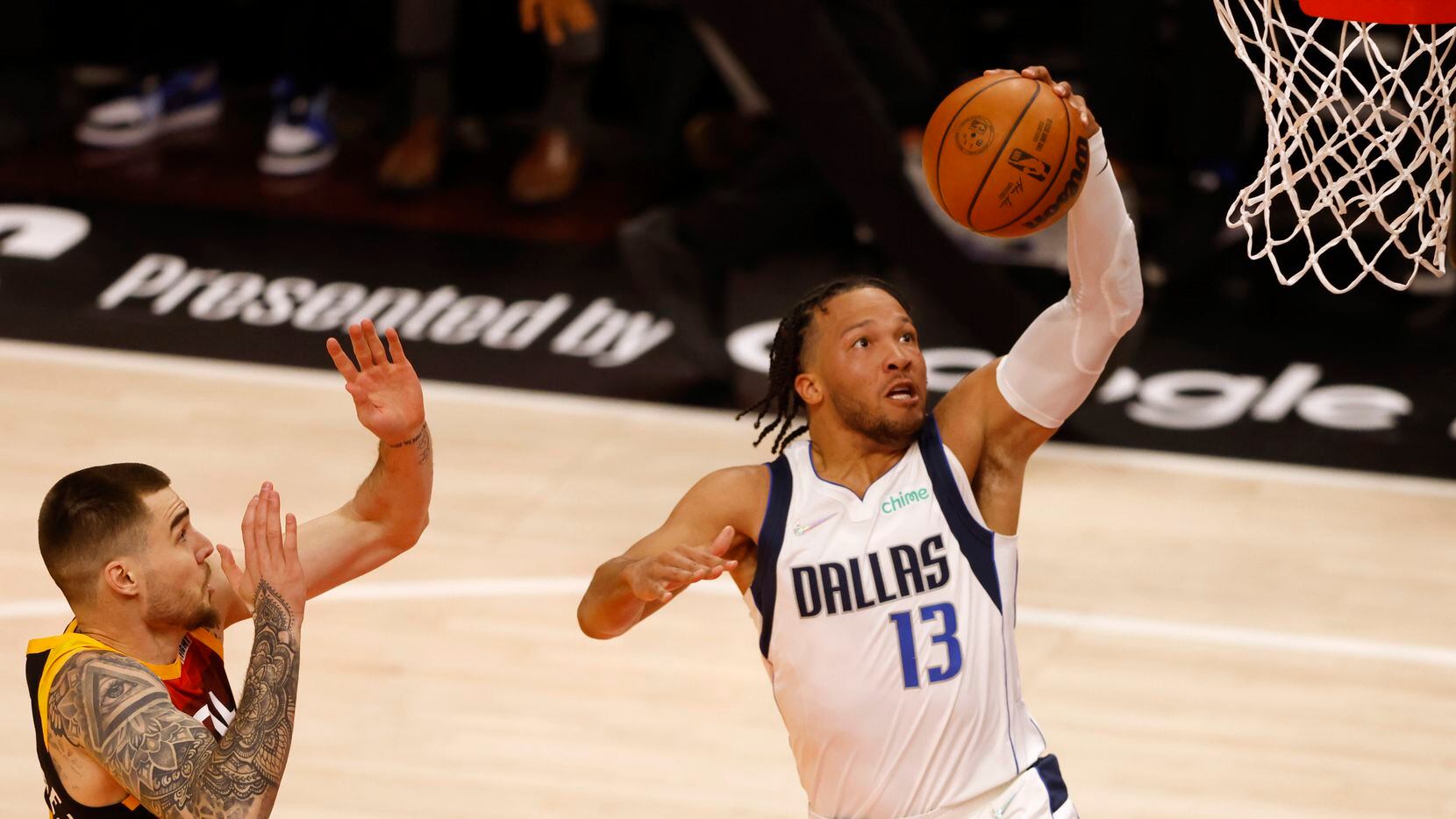 Dallas Mavericks guard Jalen Brunson (13) goes up for a layup before getting fouled by Utah...