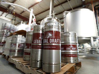 Kegs of beer in front of the brew house at Legal Draft Beer Co. in Arlington, Texas Oct. 1,...