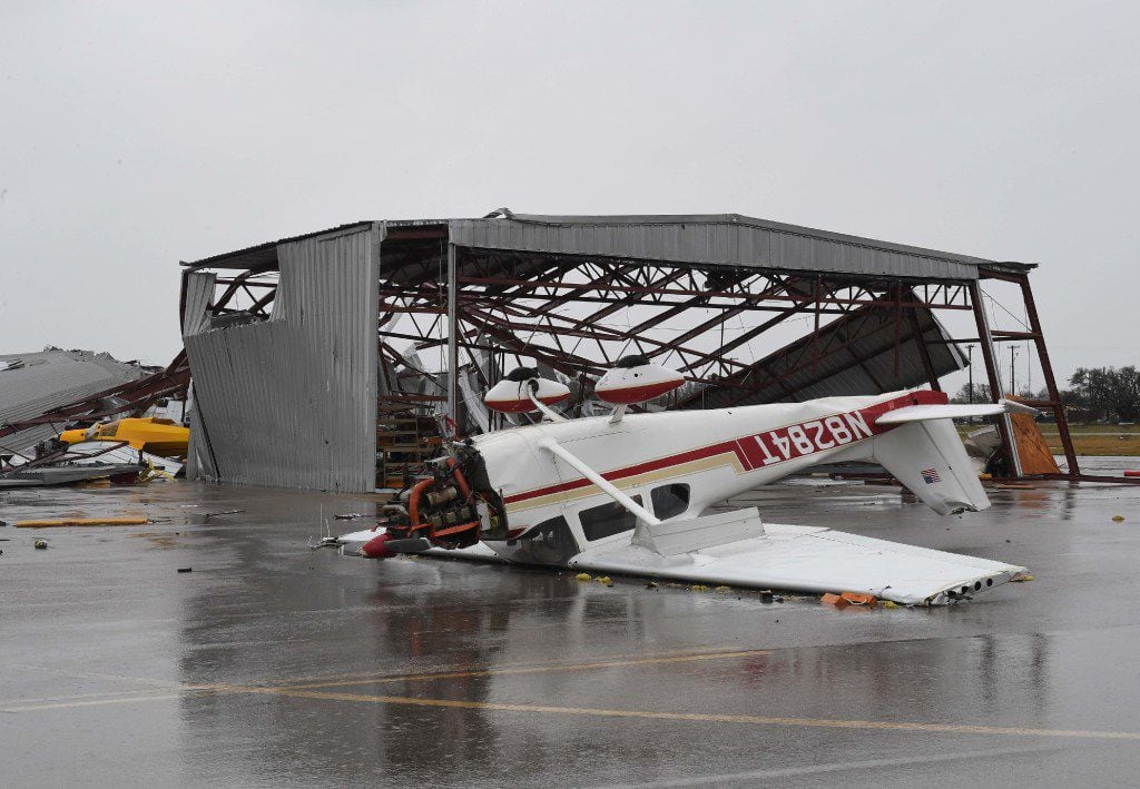 A light plane sits upside done at Rockport Airport after heavy damage when Hurricane Harvey hit Rockport, Texas on August 26, 2017.  
Hurricane Harvey slammed into the Texas coast late Friday, unleashing torrents of rain and packing powerful winds, the first major storm to hit the US mainland in 12 years.