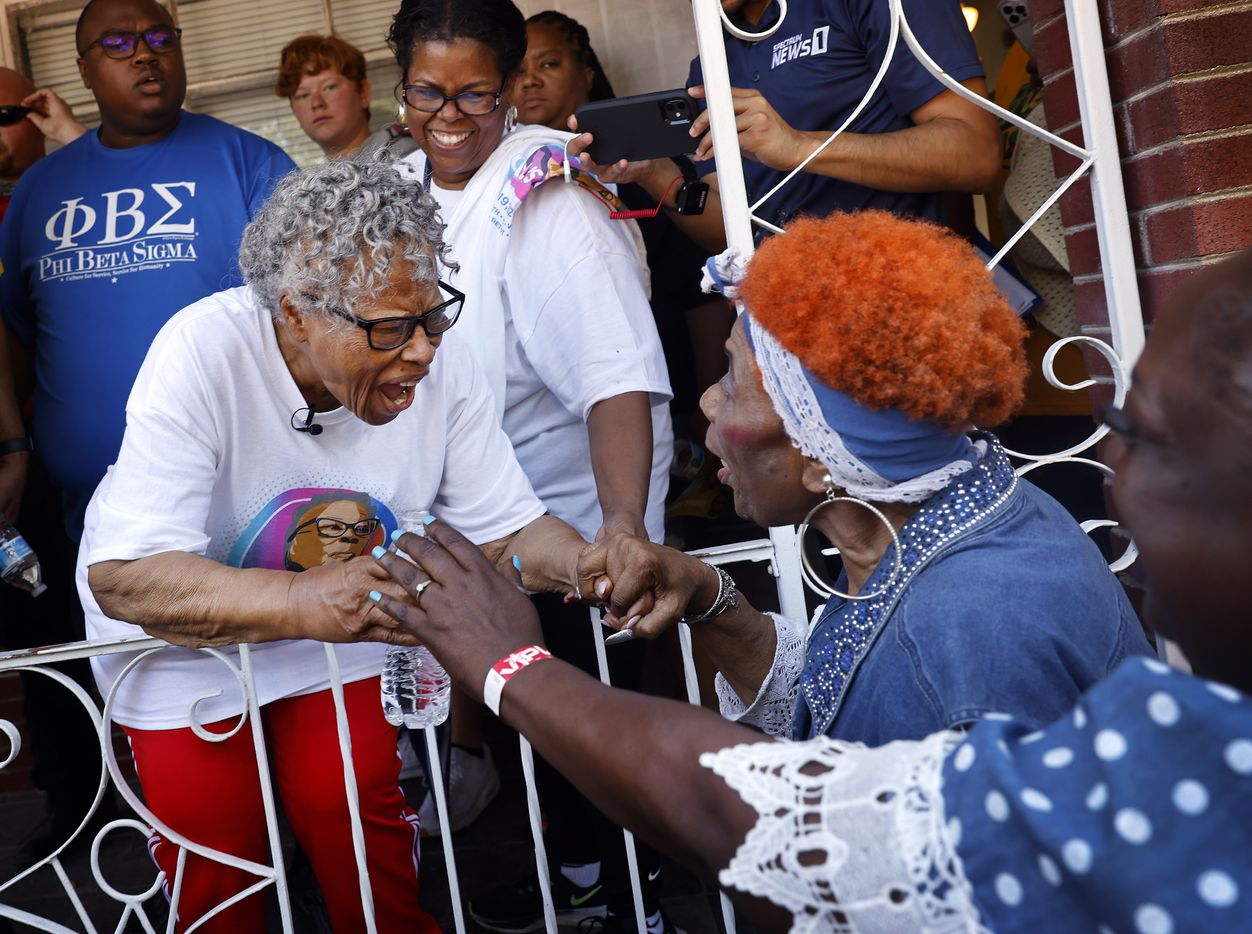 Longtime friend Lucille Williams (right) surprises Opal Lee during a Juneteenth breakfast...