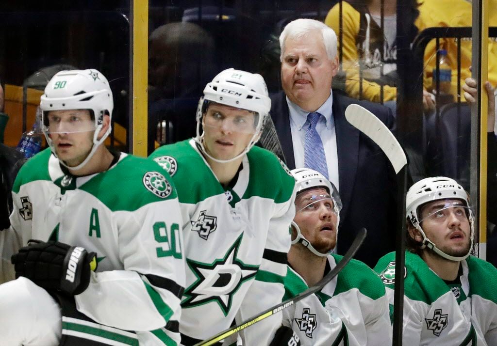 Dallas Stars head coach Ken Hitchcock watches from the bench in the third period of an NHL...