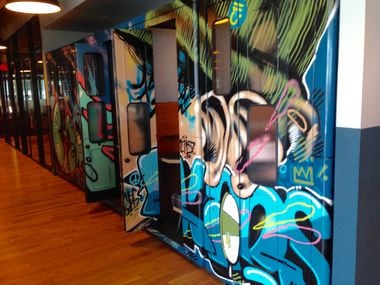 Phone booth style work pods in WeWork's office provide quiet spaces for workers to hide away...