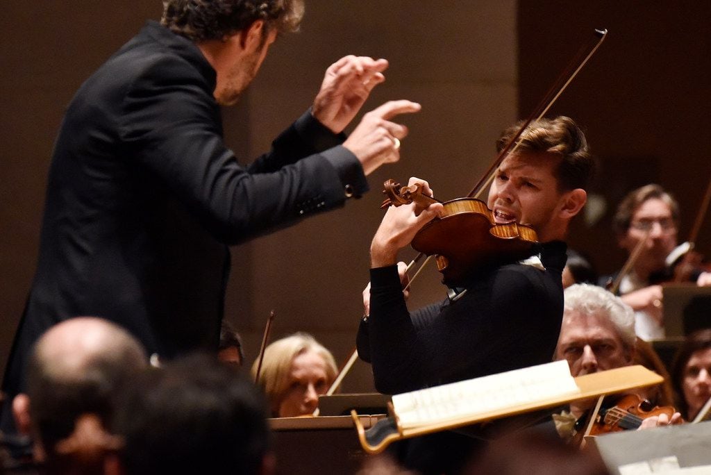 Violinist Blake Pouliot (right) and conductor Pablo Heras-Casado warmly shaped the Brahms...