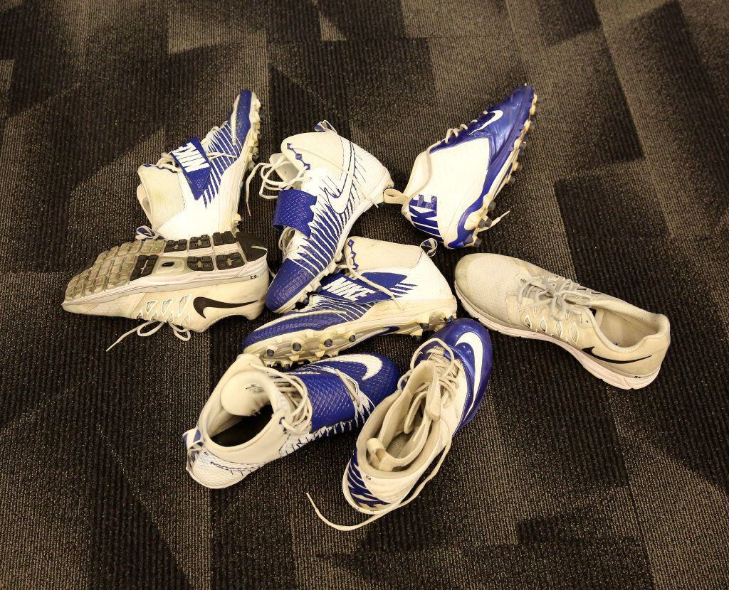 A pile of cleats inside the Dallas Cowboys' locker room at The Star in Frisco, Texas on Jan....