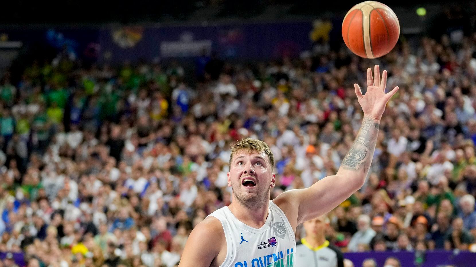 Luka Doncic of Slovenia controls the ball during the FIBA EuroBasket 2022 g...