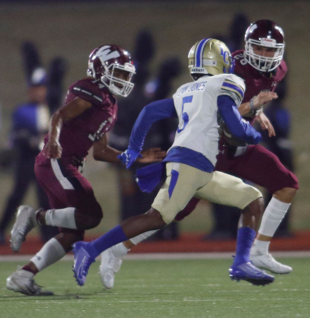 Garland Lakeview receiver Cambryn Jones (5) tacks extra yardage after a reception as Wylie...