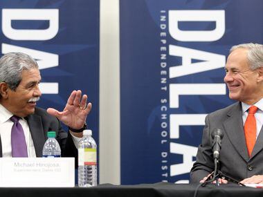 Dallas ISD Superintendent Michael Hinojosa, left, and Governor Greg Abbott meet with...