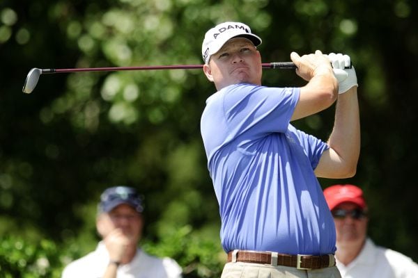 File photo. Chad Campbell tees off on the first hole during the third round of the PGA Byron...