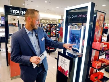 NorthPark Macy's vice president/store manager Josh Adkins demonstrates how the You Cam...