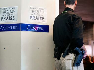 A member of the event security team stands at the doorway to the sanctuary at North Pointe...
