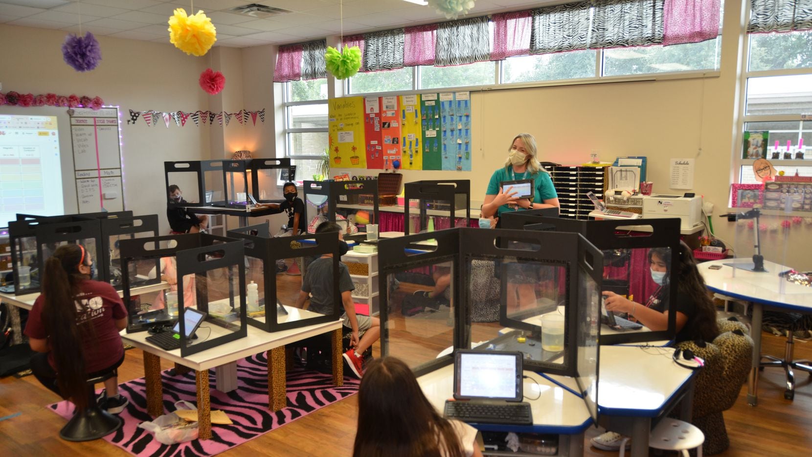 Northwood Hills Elementary School teacher Lauren Martinez speaks to her fifth grade...