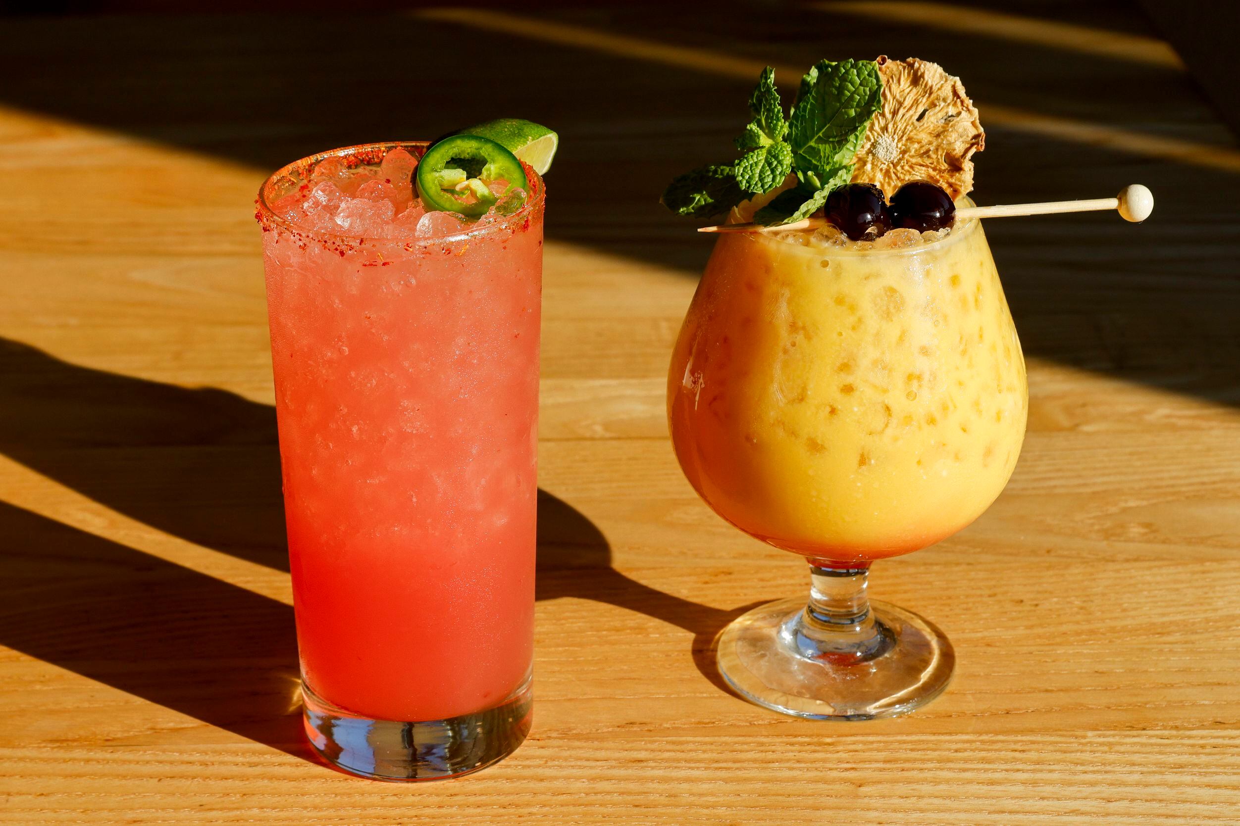 The Texas Heat (left) and Staycation cocktails pictured at F1 Smokehouse, Wednesday, Sept....