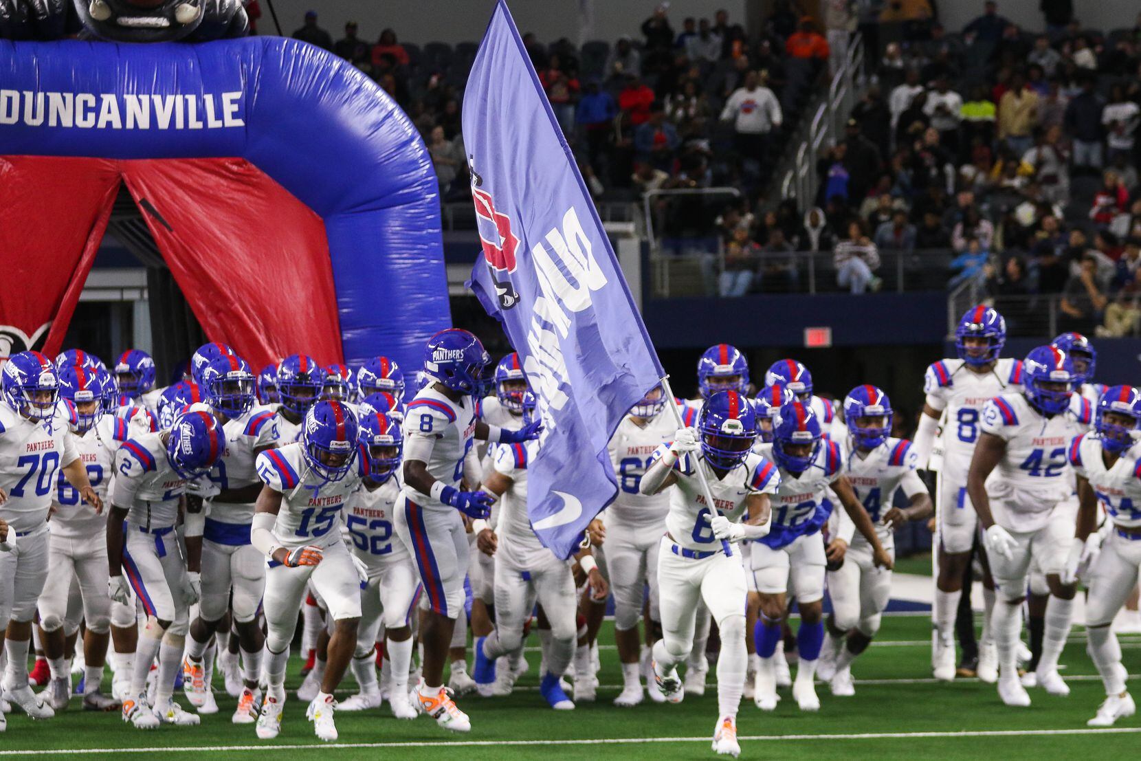 Duncanville players run out before a Class 6A Division I state championship game against...