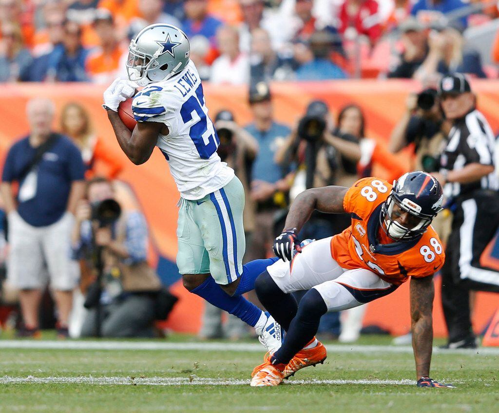 Dallas Cowboys cornerback Jourdan Lewis (27) intercepts a pass intended for Denver Broncos...