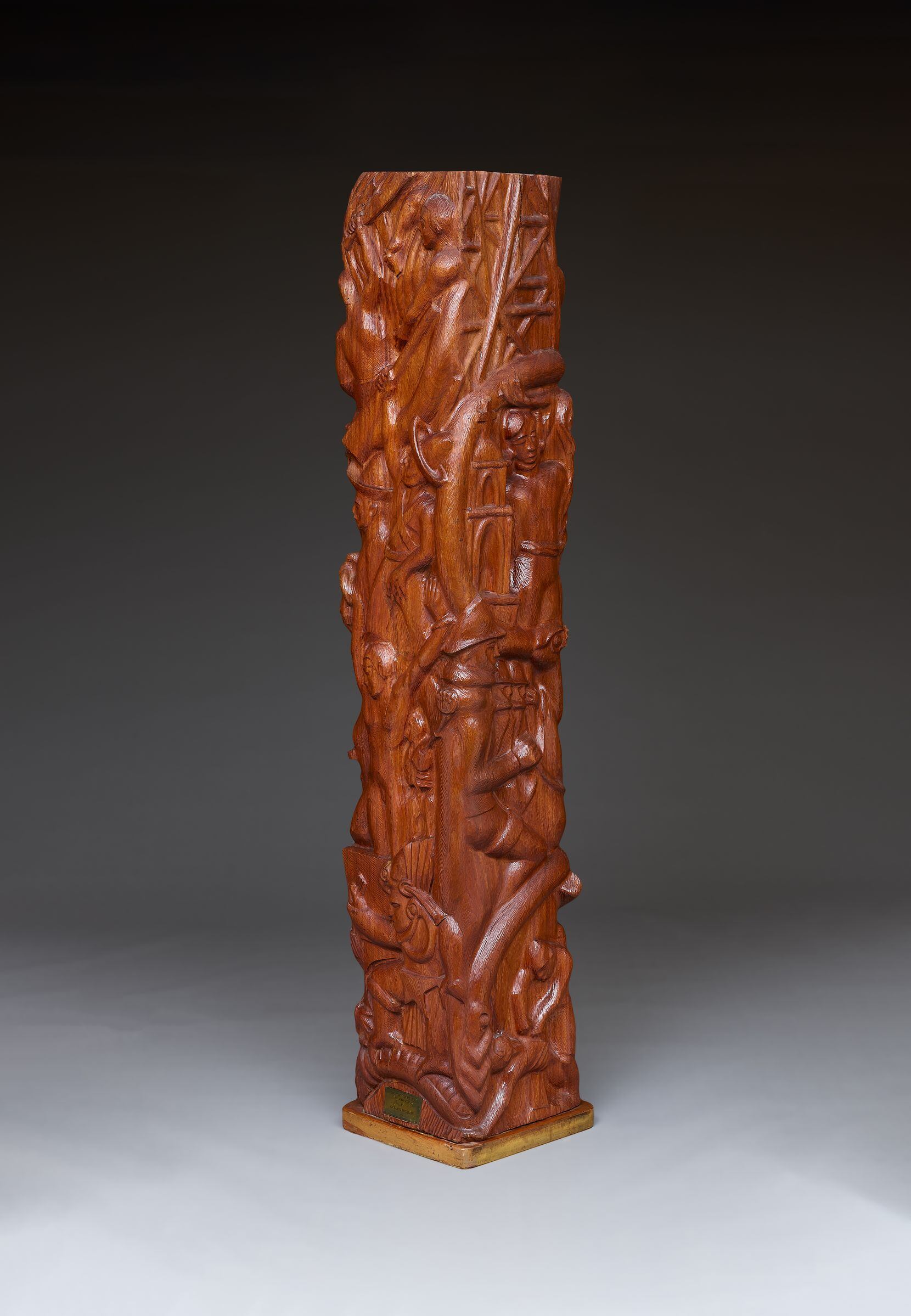Octavio Medellín's "History of Mexico," a 1950 carving in red mahogany, covers many...