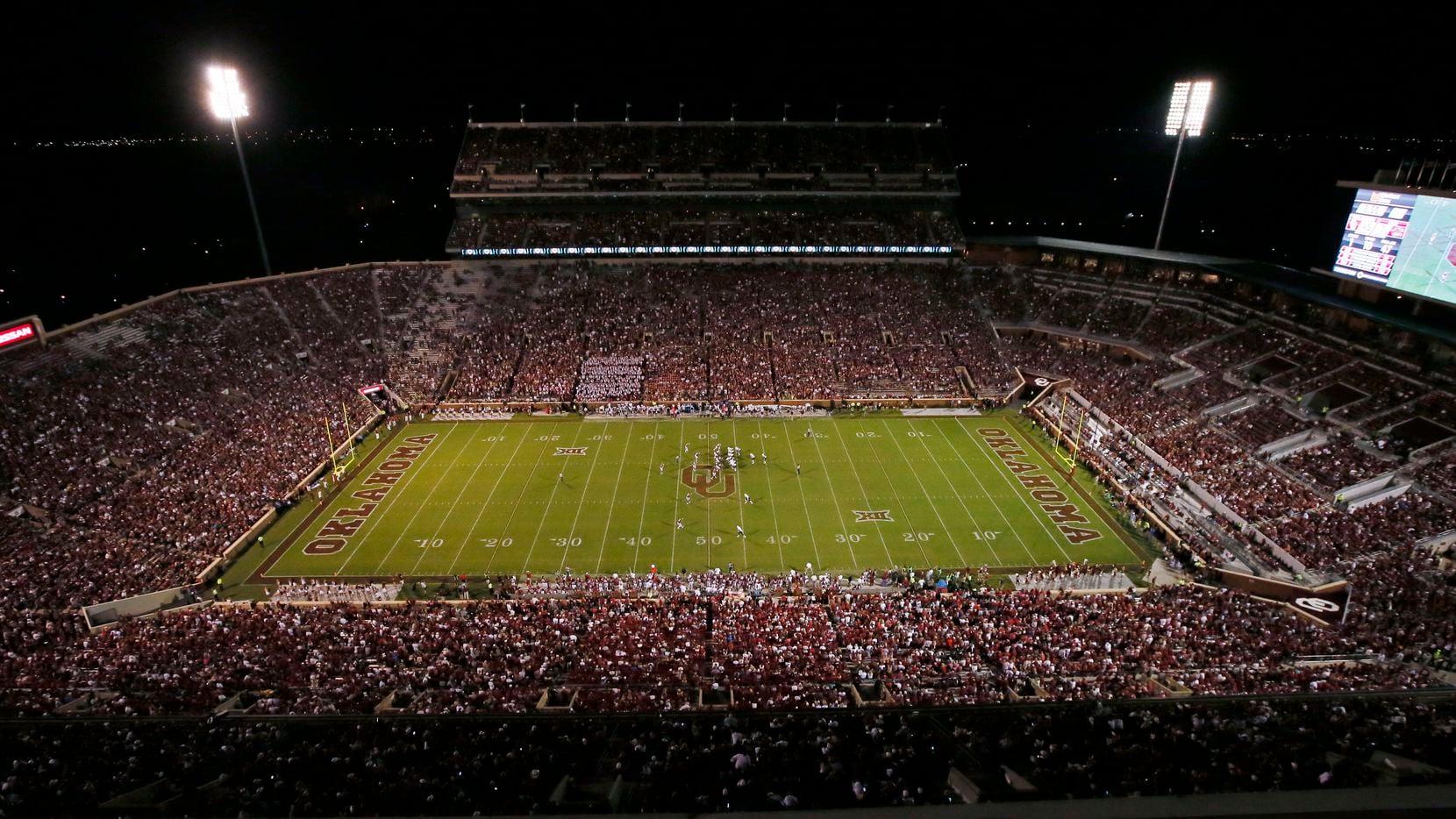 Oklahoma faces Louisiana Monroe in the third quarter of an NCAA college football game in Norman, Okla., during their home opener in their newly renovated stadium, Saturday, Sept. 10, 2016. The south end of the Gaylord Family - Oklahoma Memorial Stadium, at right, has been enclosed and is now a complete bowl.