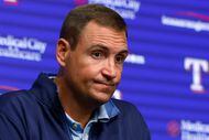 Texas Rangers general manager Chris Young listens to a question during a news conference...