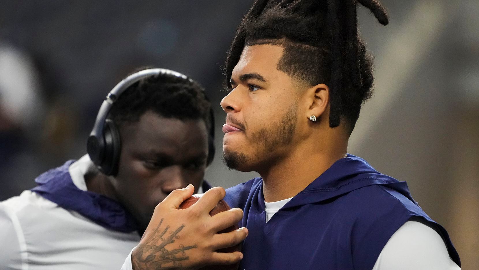 Dallas Cowboys defensive tackle Trysten Hill warms before an NFL football game against the...