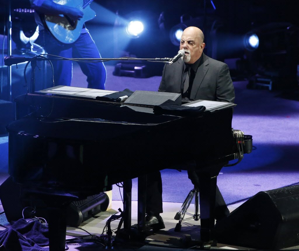 Billy Joel performs during his concert at the American Airlines Center in Dallas on...