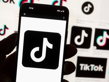 FILE - The TikTok logo is seen on a cell phone on Oct. 14, 2022, in Boston. Maryland is...
