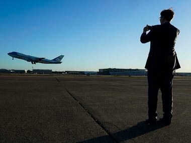 Texas Lt. Gov. Dan Patrick photographs Air Force One as it takes off from Dallas Love Field...