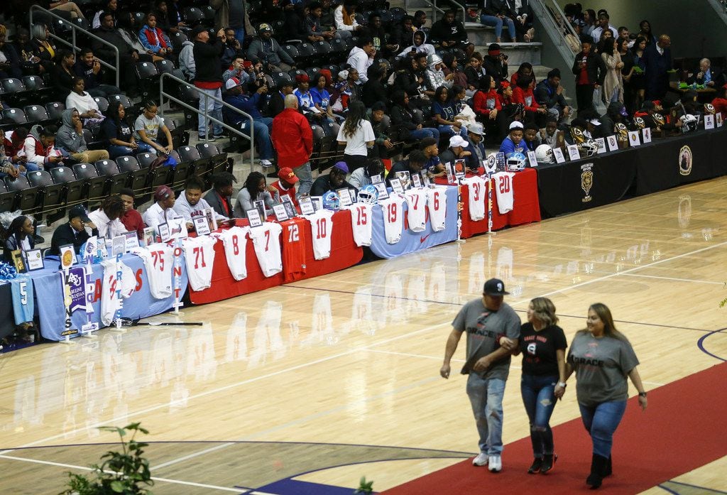Players take their seats during a Dallas ISD signing day event at Ellis Davis Field House on...